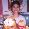 Vangie Holding the two Garfield dolls I got for her.